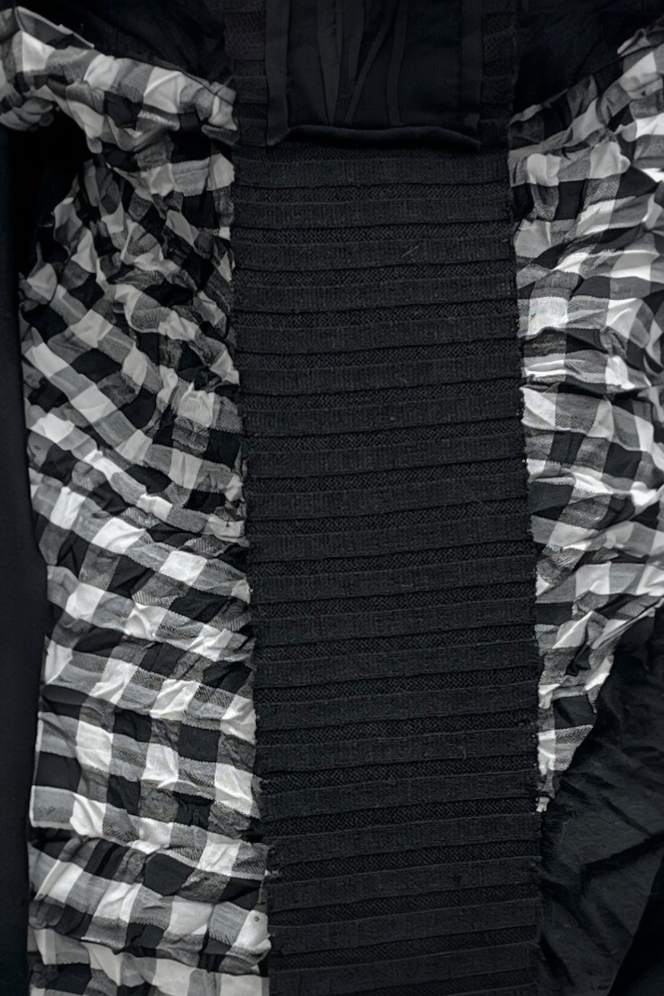 Triangular scarf with checkered insert