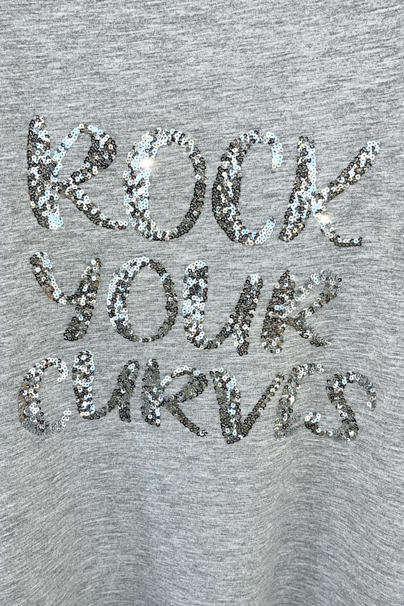 Tunic with sequin embroidery