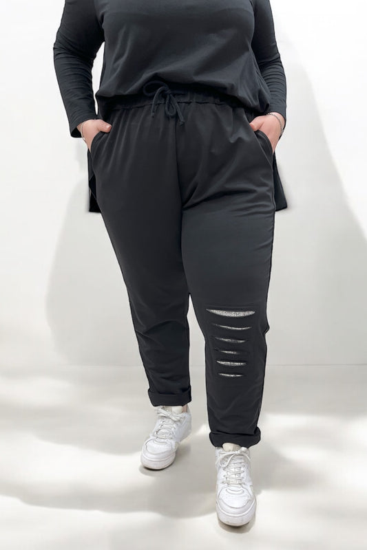 Jogging pants with appliqué