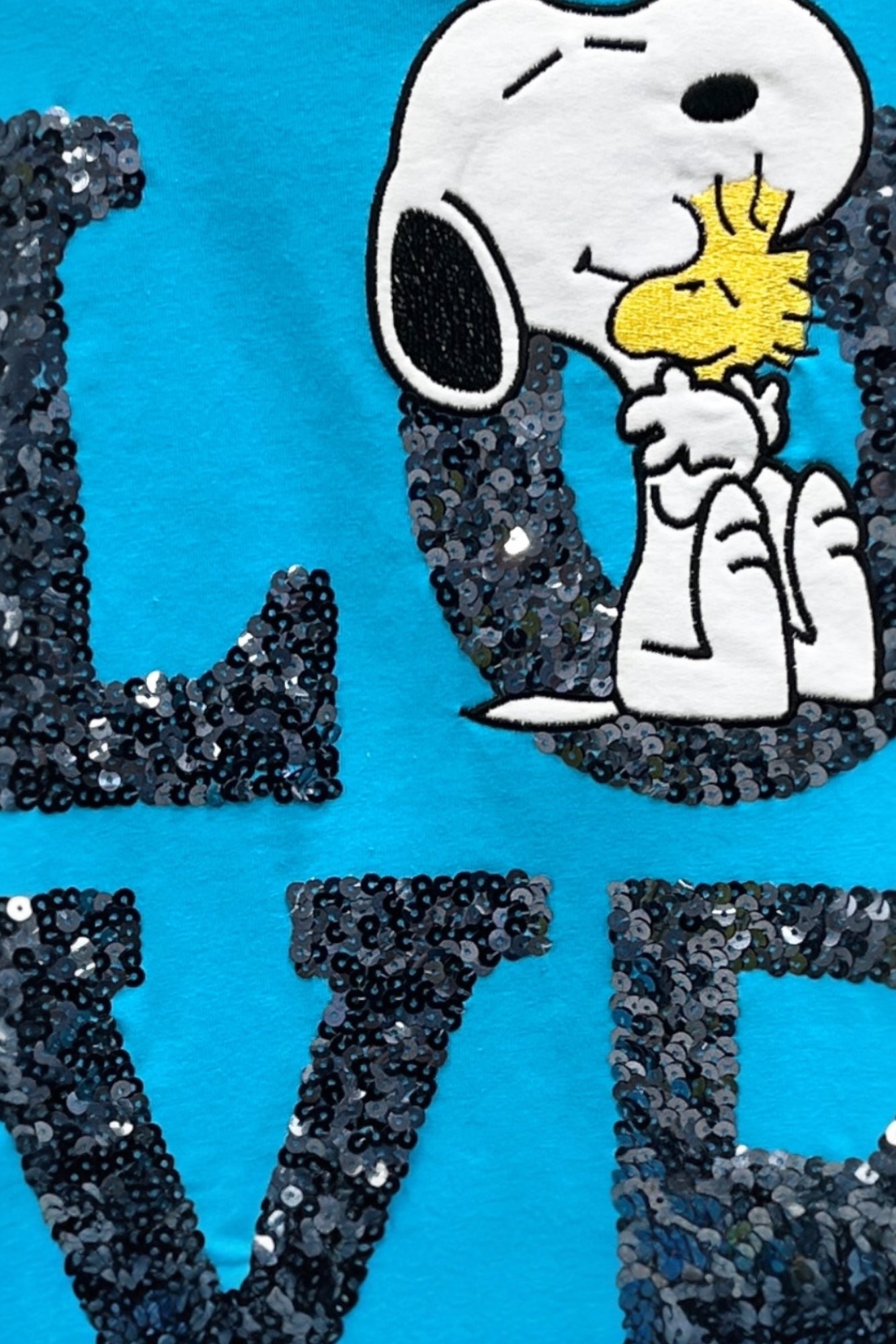 Tunic with appliqué